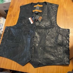 I’m selling a new with tags a men’s black vest